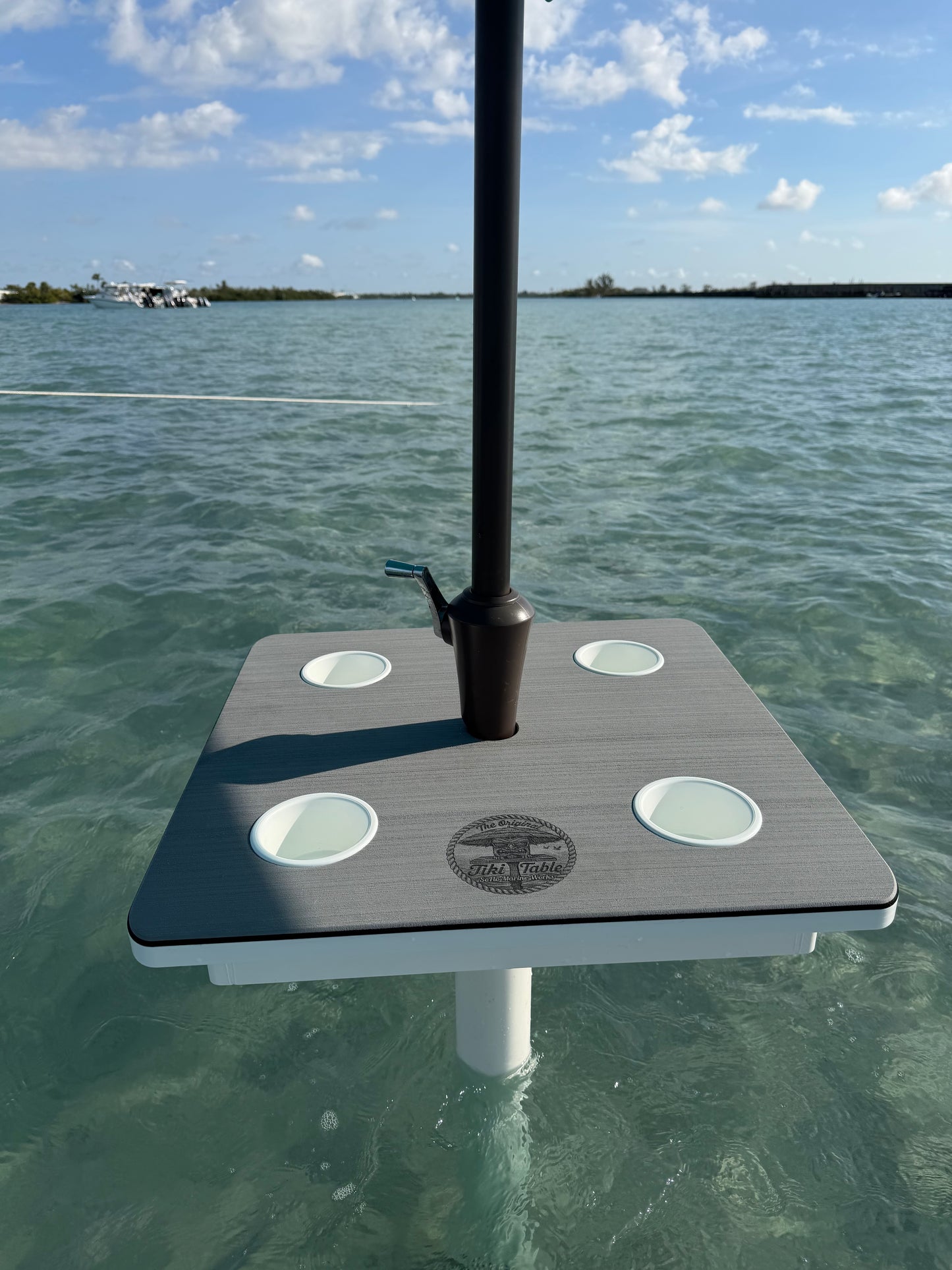 Skipper Tiki Table lifestyle photo — coastal outdoor entertaining
